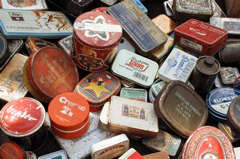 old metal tin that went around the house|valuable antique tins.